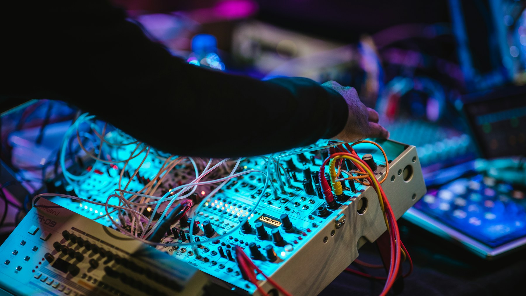 Mastering engineer working at a professional mixing console